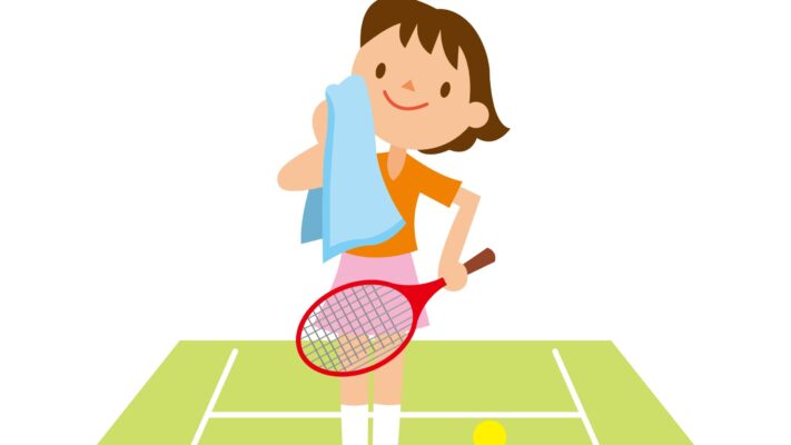 汗を拭く女子テニスプレーヤー